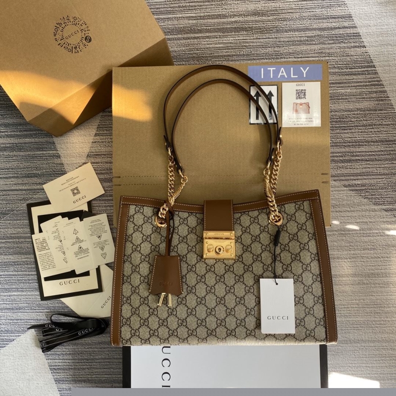 G*u*i top handle bags
